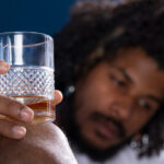 front-view-depressed-man-with-alcohol
